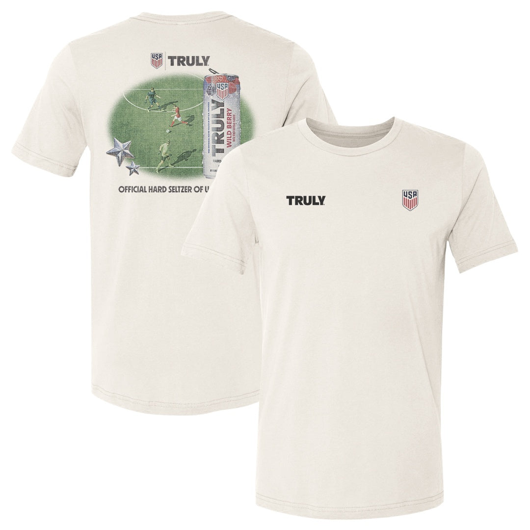 Cream colored tee shirt with a USA soccer logo on the left chest and truly logo on the right. Back graphic is a vintage style design of soccer field scene, a truly wild berry can, and "Official Hard Seltzer of U.S. Soccer"