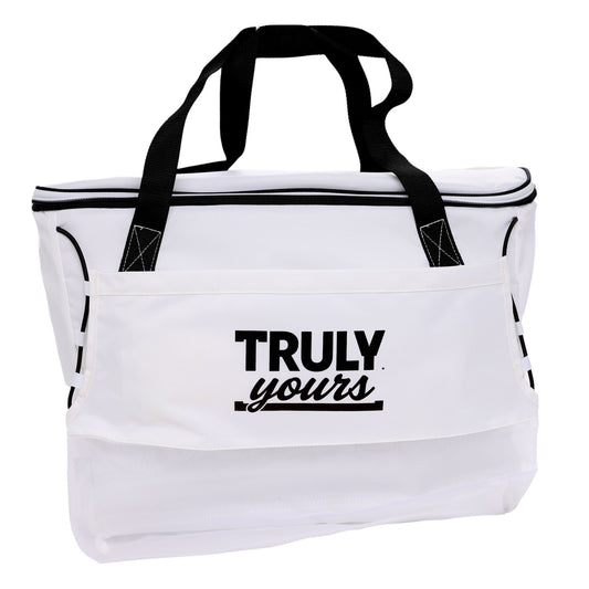 White tote bag with black handles and a front pocket. The pocket features the text 'TRULY yours'—'TRULY' in bold uppercase letters and 'yours' in cursive. The bag has a top zipper closure and black stitching on the handles.