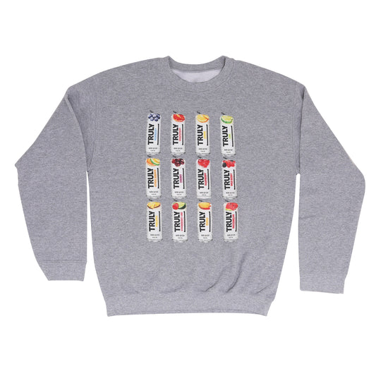 Front view of grey crewneck features three rows of four truly cans and flavors.