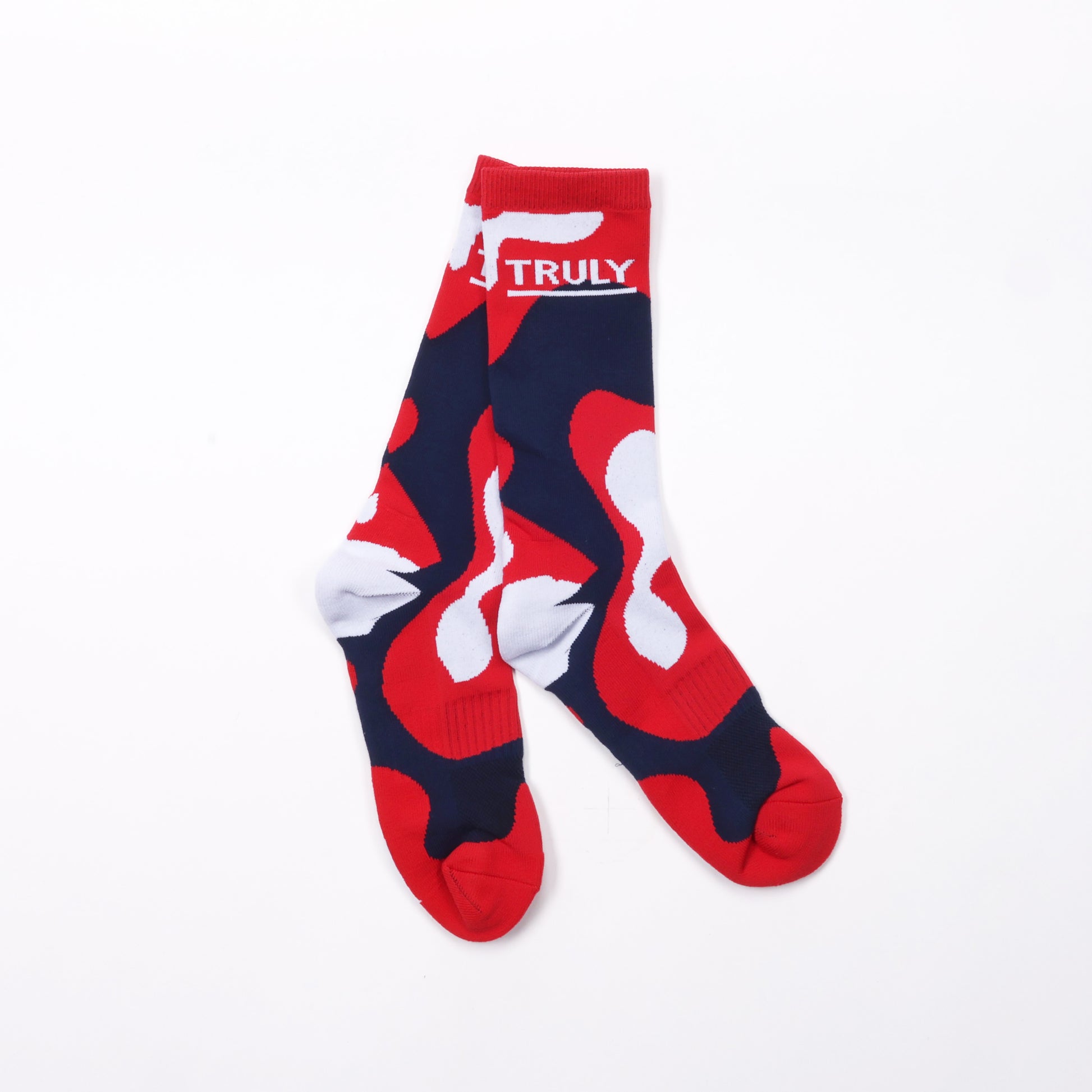 pair of patterned tube socks with red, white and blue color tones. TRULY text towards top edge